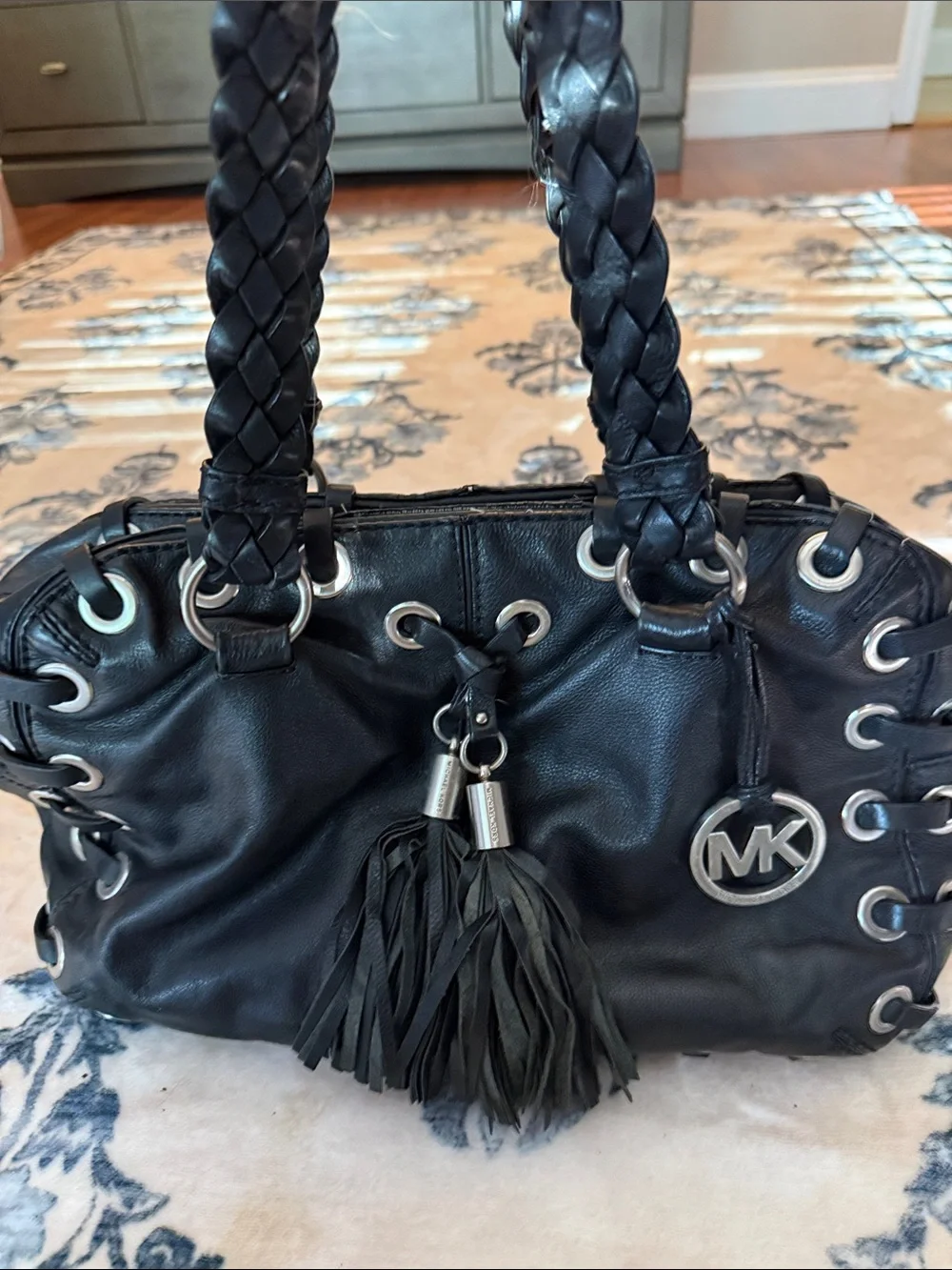 Michael Kors Black Leather Shoulder Bag with Braided Handles and Tassel